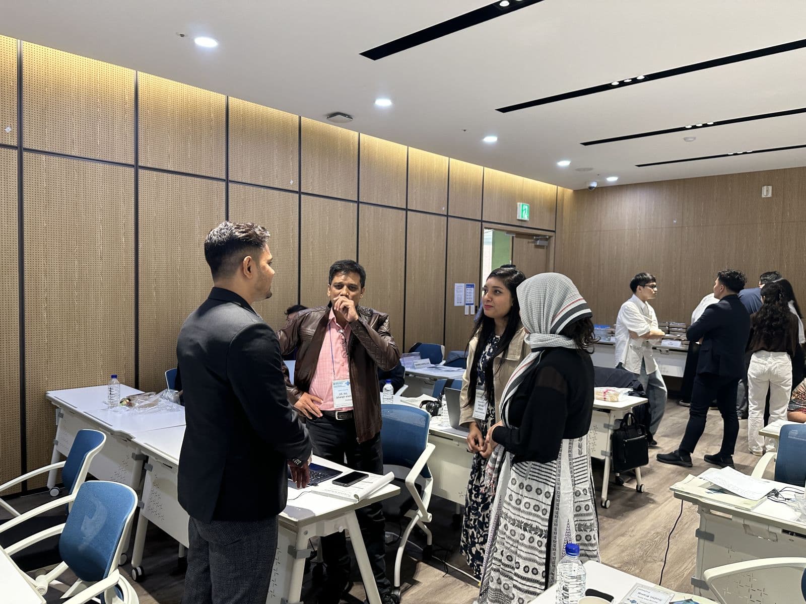 Talking with Dr. Jahangir, Dr. Salima Akter and Nahida Apu between sessions